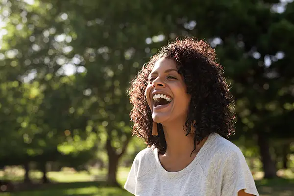 Woman laughing with mouth wide open Woman laughing with mouth wide open